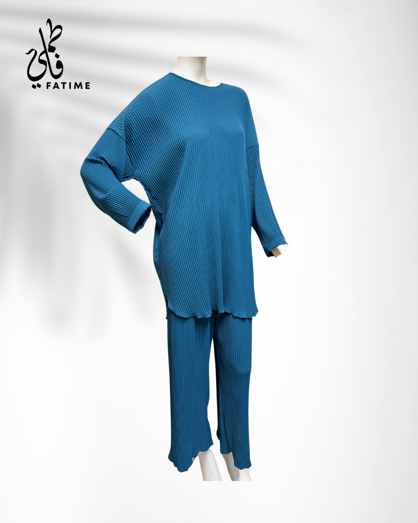 Soft stretchable blue two-piece abaya
Abayain uk